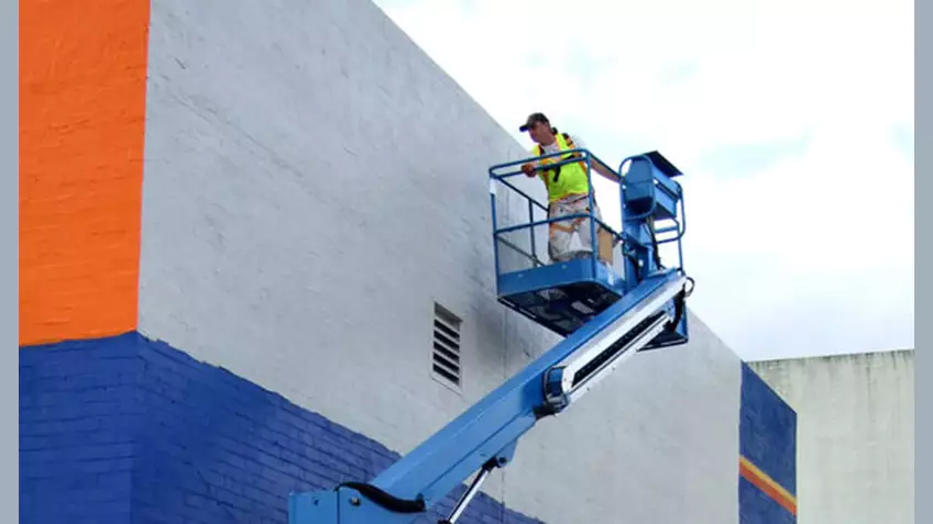 Robotic painting solutions for high-rise buildings